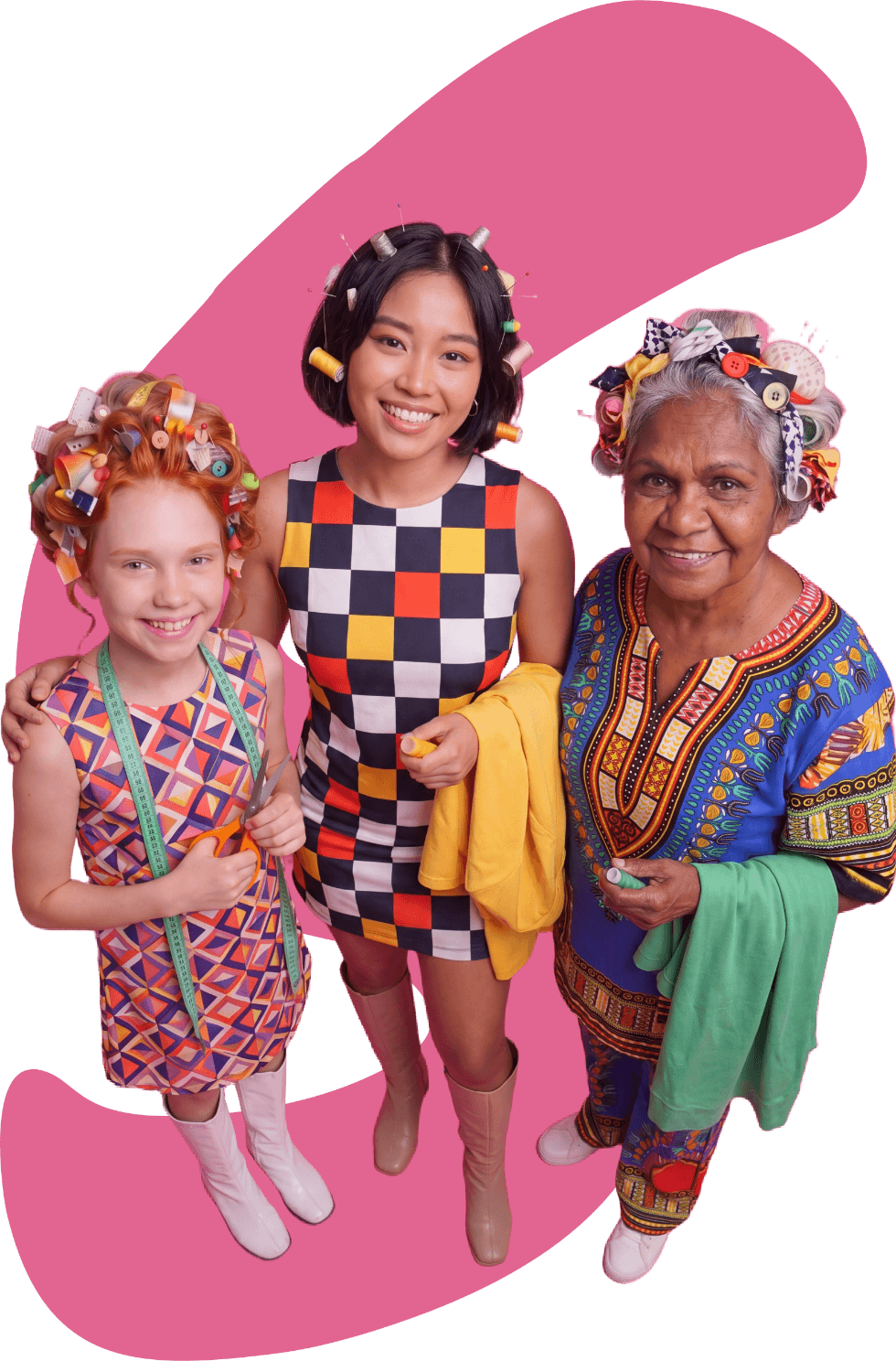 Three smiling participants with sewing accessories, ready to mend
